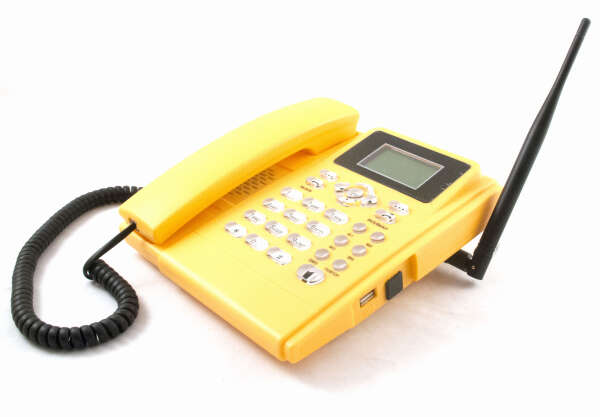 Kammunica-GSM-Phone - стационарный GSM телефон, BabyCall, ЖКД, внешняя антенна, аккумулятор, желтый корпус